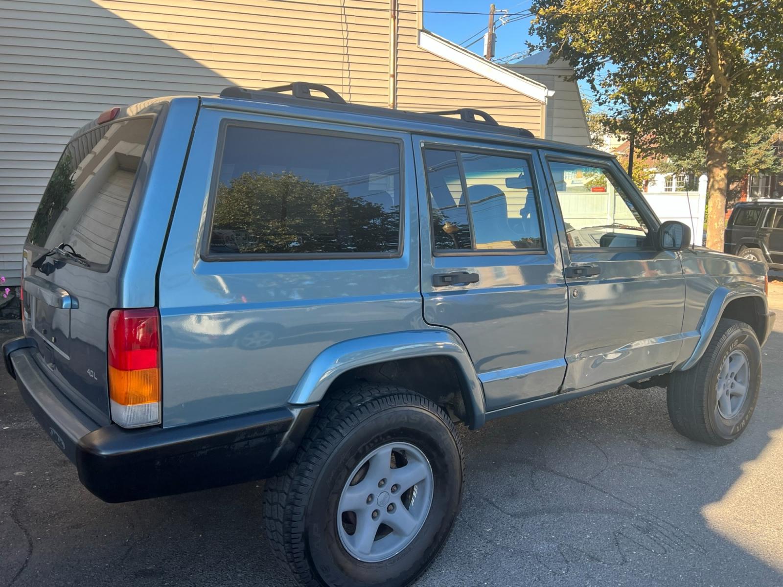 1999 Blue Jeep Cherokee (1J4FF68SXXL) with an 6 cyl. 4.0 engine, located at 1018 Brunswick Ave, Trenton, NJ, 08638, (609) 989-0900, 40.240086, -74.748085 - Photo #1